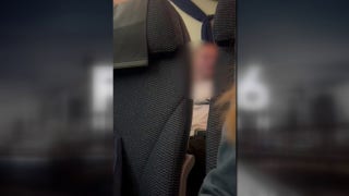 Passenger attempts to open plane door mid-flight while experiencing in medical crisis - Fox Business Video