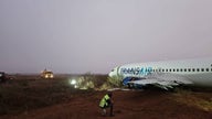 Boeing jet skids off runway, injuring at least 10