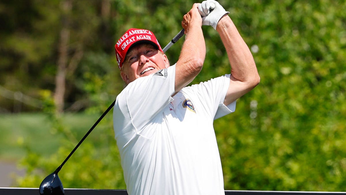 Trump golfing