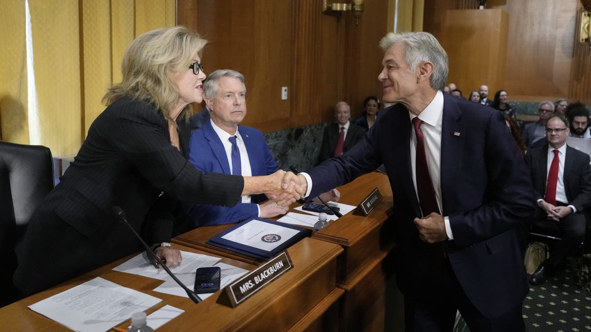 Dr. Oz shakes hands