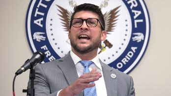 Florida attorney general held in contempt after challenging court's block on immigration law